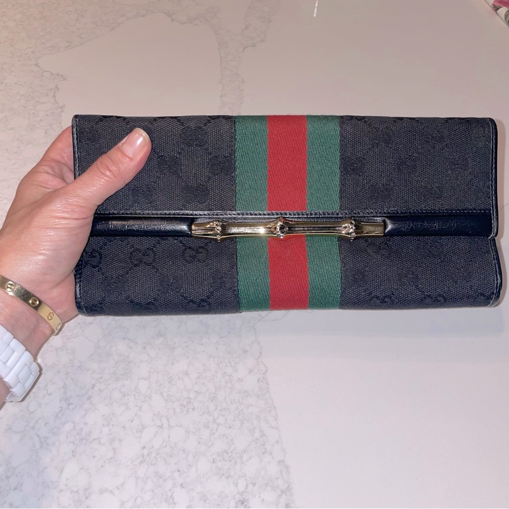 Gucci black stripe gold bamboo GG logo Sherry clutch